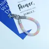 Huayang Macaron Cordón de Teléfono Colorido Correa de Muñeca Anti-Pérdida de Gama Alta Llavero Colgante para Bolsa Venta al por Mayor