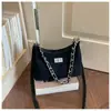 Elegante bolso de dos tonos para mujer, nuevo modelo de moda 2026, bolso de hombro simple, versátil para el trabajo y uso casual, bolso cruzado