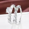 Nuevo Anillo de Zirconia Redonda de Cuatro Garras Más Vendido Juego de Dos Piezas Moda Creativa Forma de Bala Anillo de Pareja de Cobre Puro Venta al por Mayor