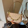 Bolsa Quadrada Pequena Estilo Novo 2026 Versátil Bolsa de Mahjong Bolsa de Mão Estilosa Bolsa Transversal Moda Feminina Bolsa de Ombro/Axila