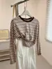 Camiseta de manga larga a rayas y bloques de color estilo coreano para mujer, primavera y otoño, versión coreana, corte holgado, adelgazante, camiseta básica, top para superponer, comercio exterior