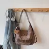 Bolsa de mano grande personalizada retro transfronteriza para mujer, nuevo diseño casual de nicho 2026, bolso de hombro y cruzado