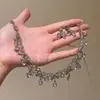 Aretes Colgantes con Forma de Gota y Lazo de Diamante Collar Lujo Accesible Cadena de Clavícula de Nicho Joyería Elegante Versátil para Mujer Gama Alta