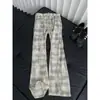 Pantalones casuales a cuadros transfronterizos, nuevo estilo de verano para hombre, marca de tendencia americana, corte casual holgado, pierna recta de alta costura, pantalones ligeramente acampanados