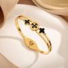 Versión coreana de la nueva concha negra en la pulsera de acero de titanio de trébol de cuatro hojas para taladro, moda femenina, personalidad, pulsera Joker, fabricantes en nombre del cabello