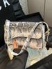 Comercio exterior este año popular bolso pequeño cuadrado estampado de serpiente para mujer 2025 nuevo verano moda personalidad bolso de axila bolso cruzado retro