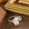 Moda Transfronteriza Europea y Americana Diseño Exquisito Lava Líquida Irregular Perla de Imitación Circona Apertura Anillo Ajustable