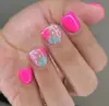 Colección Transfronteriza Nueva de Gran Venta de Arte para Uñas Fresco y Hermoso, Uñas Postizas de Estilo Francés Sencillo de Gama Alta con Flores Pequeñas en Forma de Corazón al por Mayor