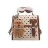 Bolso de mano cuadrado pequeño, moderno y dulce, transfronterizo para mujer, nueva colección otoño 2026, bolso de hombro de lunares y bloques de color, mochila versátil
