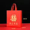 Bolsa de presente portátil festiva não tecida vermelha bolsa da sorte embalagem de casamento presente de casamento Ano Novo Chinês bolsa com palavra da sorte em estoque