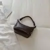 Bolso de Axila de Nicho para Mujer 2026 Nuevo Otoño Retro Bolso de Hombro Único para Viaje Diario Versátil Bolso Cruzado de Hombro Único