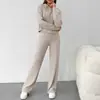 Conjunto casual transfronteiriço outono 2026 europeu e americano para mulheres: moletom com capuz e calça comprida de modelagem solta, um conjunto de duas peças para exportação