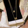 Collar de Acero de Titanio con Colgante de Letra H de Doble Capa Estilo Ins de Lujo Ligero Cadena para Clavícula Dorada Simple Elegante Joyería de Nicho