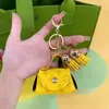 Bolsa Pequena Vintage de Couro Criativa para Venda por Atacado Chave Mini Armazenamento Fone de Ouvido Fivela Borla Porta-Moedas Armazenamento Criativo