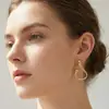 Corea del Sur Dongdaemun Nueva joyería Internet Moda popular Viento frío Pendientes geométricos exagerados Pendientes de viento de Hong Kong retro Mujeres