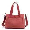 Bolsa Feminina 2025 Nova Tendência Transfronteiriça Tecido de Nylon Bolsa de Ombro de Grande Capacidade Bolsa Transversal Portátil Feminina Leve