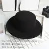 GD moderno casual sombrero de copa negro estrella mismo estilo sombrero de copa retro caballero estilo británico copa plana sombrero plano de tweed de copa plana para hombres y mujeres