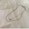 Collar Europeo y Americano Apilado de Doble Capa Cadena para Clavícula de Mujer 2023 Nuevo Estilo Pequeño en L Simple Elegante Combinable