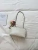 Bolso de axila de nicho de alta gama nuevo para mujer en comercio exterior transfronterizo, bolso cuadrado pequeño texturizado moderno y simple, bolso de hombro para el día a día