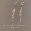 Brincos de Franja Longa de Cristal de Luxo Leve de Nicho de Alta Qualidade para Mulheres Moda Temperamento Brilhante Brincos de Zircônia Brincos Atacado