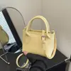 Bolsos Pequeños de Estilo Occidental de Alta Gama Transfronterizos 2025 Nuevos Bolsos para Mujer Otoño Versátil Moda Bolso Cruzado Bolso de Cubo Portátil