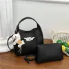 Bolso de cubo minimalista de alta gama transfronterizo para mujer, nuevo bolso de hombro cruzado versátil de nicho de moda 2026, bolso de mano para el trabajo