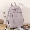 Mochila casual de color sólido, ligera, versátil, transfronteriza, unisex, mochila de viaje simple de gran capacidad, mochila escolar para estudiante