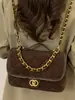 Mochila de Moda Popular Estilo Coreano para Mujer Otoño e Invierno 2025 Nueva Mochila Pequeña Casual Simple Acolchada Bolso con Cadena