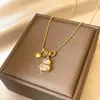 Colar com pingente de cabaça em ouro 18k banhado a ouro com zircônia cúbica, uma corrente de clavícula delicada e discreta que exala um charme suave e elegante, fazendo a pele parecer mais radiante
