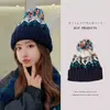 Gorro de punto cálido para mujer para otoño e invierno, estilo coreano, versátil, con patrón Fair Isle y pompón, y forro polar