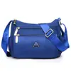 Bolsa de Tecido de Nylon Leve Repelente à Água Bolsa Transversal Casual para o Dia a Dia Novo Estilo Bolsa Simples de Bolinho Bolsa de Ombro Feminina da Moda
