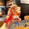 En stock, llavero nacional de la marea del león y del dragón con forma de muñeca de fruta, exquisito llavero para bolso de coche, pequeño regalo al por mayor
