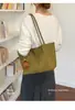 Bolsa de Palha Tecida Retrô Feminina 2026 Nova Grande Capacidade Moda para o Dia a Dia Design de Nicho Casual Bolsinha de Mão/Ombro