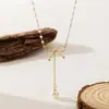 Accesorio de Collar Fragmentado de Perla y Acero de Titanio Estilo Chanel, Joyería de Lujo Ligero de Dongguan para Mujer, Cadena para Clavícula con Diseño de Nicho de Alta Gama