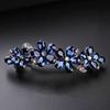 Elegante pinza de resorte de lujo de alta calidad cristal azul flor hueca pinza para el cabello pinza grande accesorios para el cabello plato cabello pinza para cola de caballo