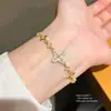 Pulsera extensible con colgante de flor de circonita estilo francés, pulsera de muñeca simple y moderna para el día a día, lujo ligero con un toque de alta gama, joyería versátil