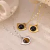 Estilo palacio retro verano temperamento total joyería incrustación geométrica diseño natural piedra ojo de tigre acero de titanio chapado en oro colgante