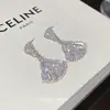 Pendientes Geométricos Súper Brillantes de Lujo Ligero con Forma de Abanico y Circonita 2026 Nuevo Estilo Pendientes de Nicho de Gama Alta Diseño Elegante Accesorios para Orejas
