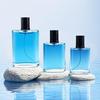 Fábrica en stock al por mayor botella de perfume vidrio transparente fragancia aceite esencial sub-embalaje rosca reutilizable soporte logo