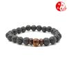 Pulsera explosiva transfronteriza directa de fábrica piedra flash natural piedra volcánica pulsera de piedra de hierro negro joyería al por mayor