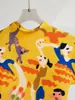 Traje de dos piezas con falda de camiseta plisada estampada de dibujos animados, popular moda de comercio exterior europeo y americano, traje de personalidad para mujer, estilo occidental