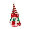 Nuevas decoraciones navideñas transfronterizas: sombreros de rayas rojas, blancas y verdes, sombreros con punta de pompón blanco y figuras de gnomos navideños de dibujos animados