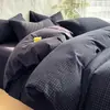 Juego de Ropa de Cama de Algodón Puro de Cuatro Piezas Funda de Edredón de Algodón Lavado Teñido en Hilo de Algodón Nuevo Estilo 2026 Suministros Juego de Tres Piezas Sábana Juego de Funda de Edredón