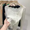 Camiseta preta puramente desejável para mulheres, combinada com um suéter preto, tricô novo estilo 2026, top de manga longa outonal de alta qualidade