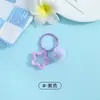 Nuevo llavero creativo de resina hueca con pentagrama, accesorio de bola de felpa colorida DIY para bolsos y colgantes