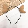 Bonita diadema de peluche con forma de cornamenta, ideal como accesorio para el pelo de dibujos animados para niños.