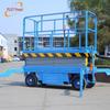 Fabricantes de elevadores móveis de Jinan consertam o elevador de tesoura móvel de quatro rodas de 10 metros usado pelo carro