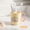Taza de enjuague bucal con diseño de dibujos animados Taza para cepillo de dientes anticaída para el hogar Taza para lavarse la cara de pareja Gran capacidad Asa antideslizante Soporte para cepillos de dientes