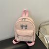 Mochila con lazo para mujer, diseño de nicho, estilo coreano, mochila escolar de moda, ligera, pequeña, para viaje, otoño e invierno, 2024