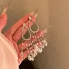 Brincos de Franja de Cristal Super Brilhantes Chegada da Deusa Chá de Pêssego Brincos Longos Statement de Alto Padrão em Estilo de Férias